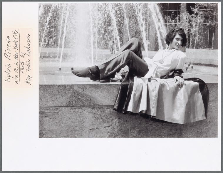 Download the full-sized image of A Photograph of Sylvia Rivera Posing in Front of a Fountain
