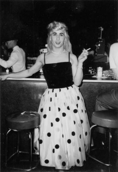 Download the full-sized image of Person in Polka Dot Dress at the Bar