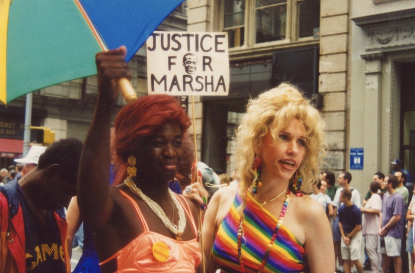 Download the full-sized image of A Photograph of Cocoa Rodriguez and Queen Allyson Posing with a "Justice for Marsha" Sign