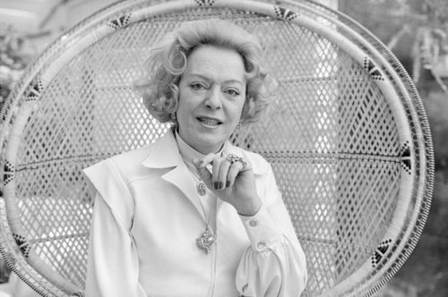 Download the full-sized image of Christine Jorgensen Poses on Chair