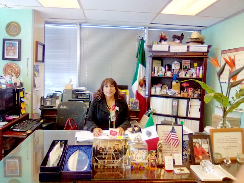 Download the full-sized image of A Photograph of Elia Chinò Sitting at a Desk