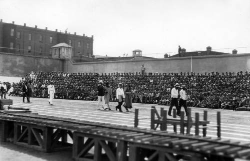 Download the full-sized image of Parade of prisoners, some in female dress, San Quentin Little Olympics Field Meet, 1930