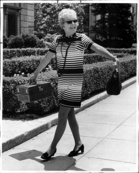 Download the full-sized image of Christine Jorgensen Walks Down the Street in Hollywood