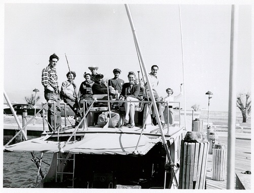 Download the full-sized image of Christine Jorgensen Poses on a Boat with Eight Others