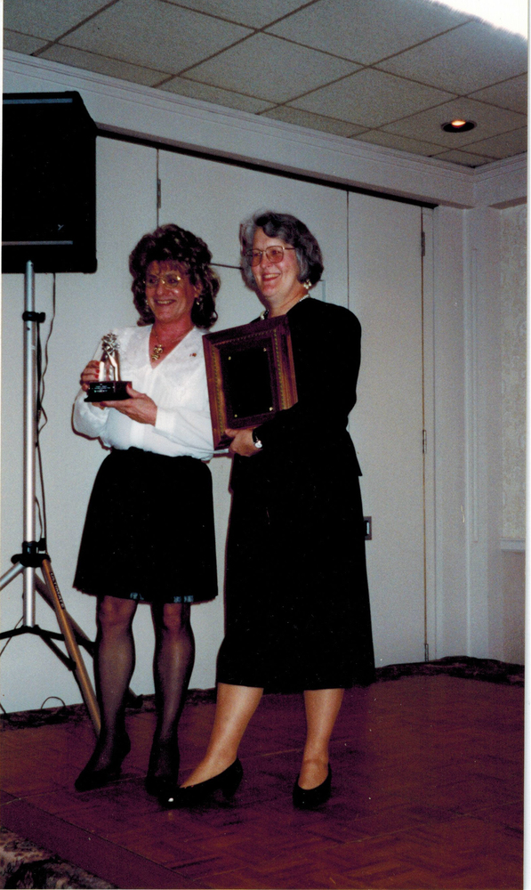 Download the full-sized image of Phyllis Frye and Unidentified Woman with Awards