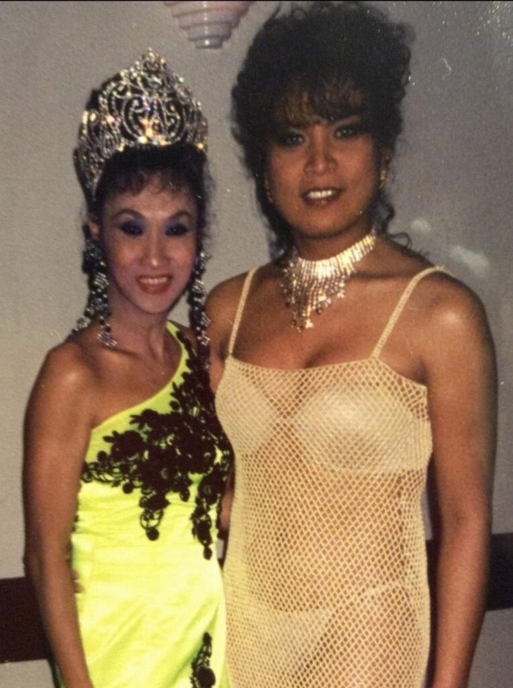 Download the full-sized image of A Photograph of Karina Samala in a Crown with Another Person