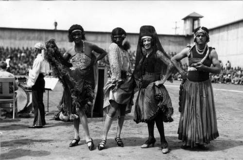 Download the full-sized image of Stage entertainment with four male dancers in female dress, San Quentin Little Olympics Field Meet, 1930
