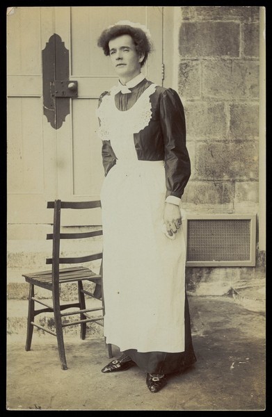 Download the full-sized image of An man dressed as a parlour-maid. Photographic postcard, ca. 1910.