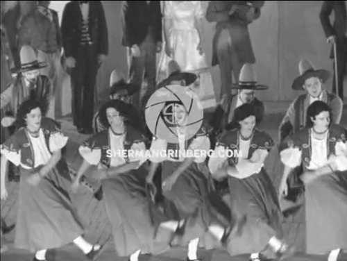 Download the full-sized image of Princeton's Triangle Club Performance with Male Students Dressed as Cowboys and Dancing Girls