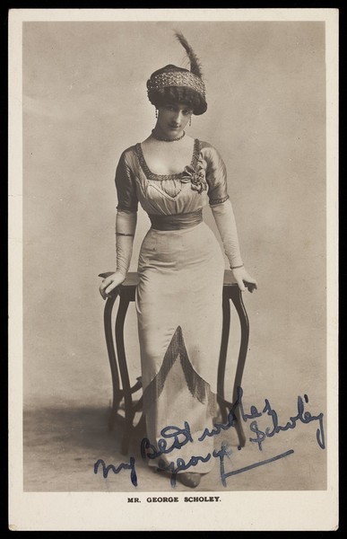 Download the full-sized image of George Scholey in drag. Photographic postcard, 191-.