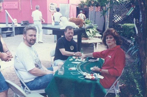 Download the full-sized image of Three Unidentified People at the 1997 Christmas in July Festival