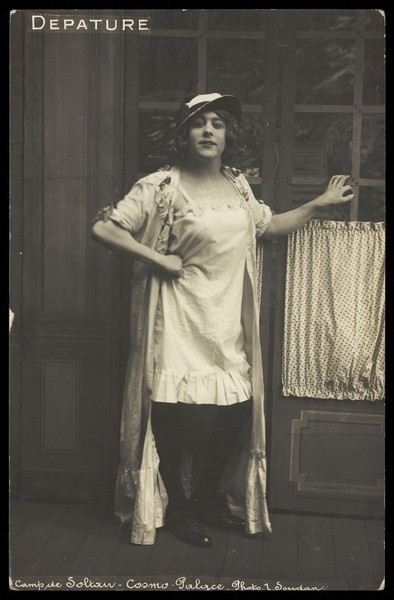 Download the full-sized image of A prisoner of war dressed in drag. Photographic postcard by L. Soudan, 191-.