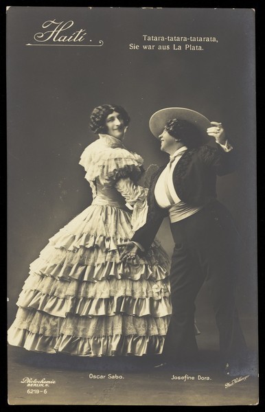 Download the full-sized image of Oscar Sabo dressed as a woman with Josefine Dora dressed as a man, as flamenco dancers. Photographic postcard by L. Willinger, 192-.