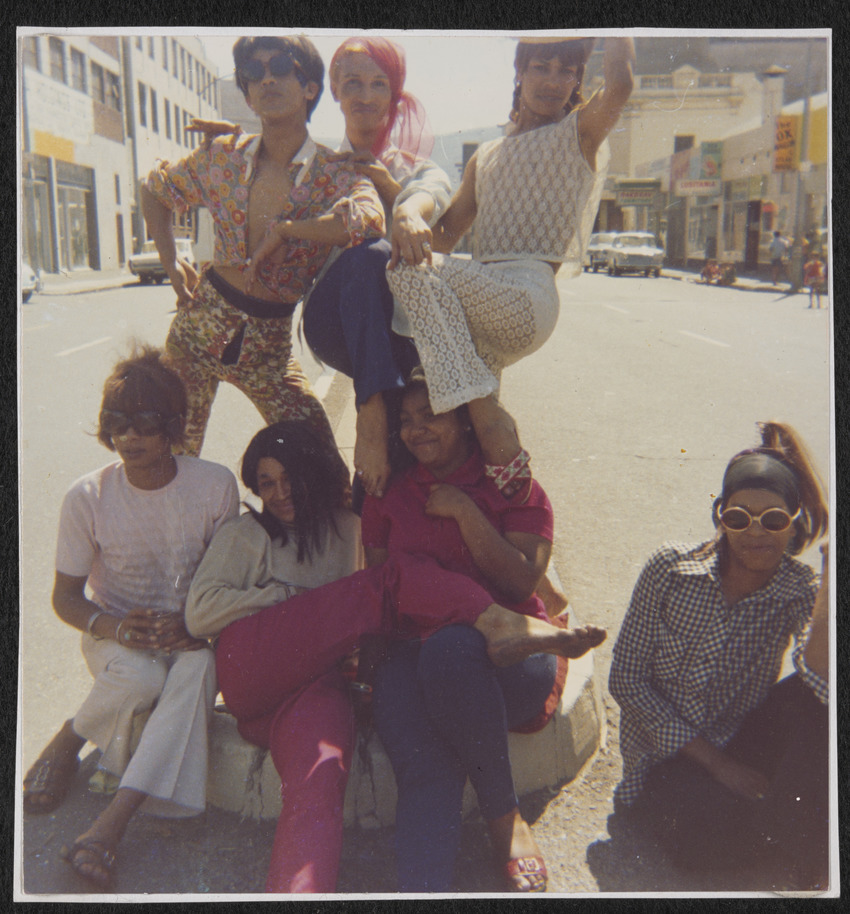 Download the full-sized image of Olivia, Kewpie, Patti, Sue Thompson, Brigitte, Gaya, and Mitzy in the Middle of the Street
