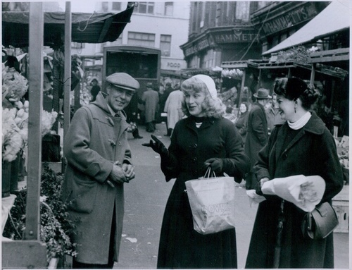Download the full-sized image of Roberta Cowell and Friend Shopping in French Market (April 22, 1954)