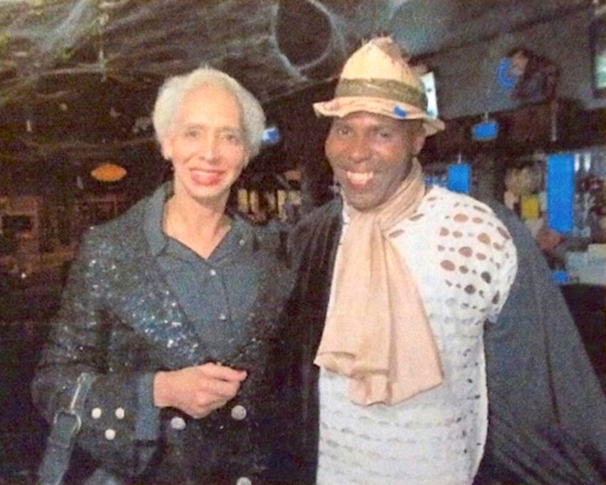 Download the full-sized image of A Photograph of Marlow Monique Dickson and a Friend in a Bar