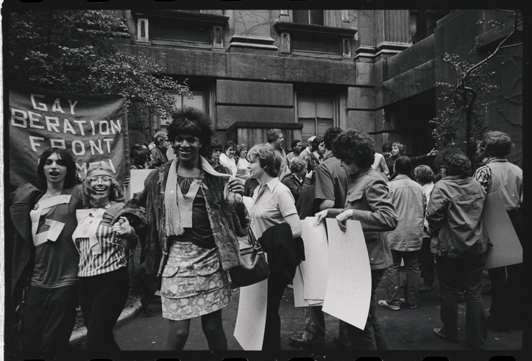 Download the full-sized image of A Photograph Featuring Marsha P. Johnson and other Gay Liberation Front Members Walking at New York City Hall
