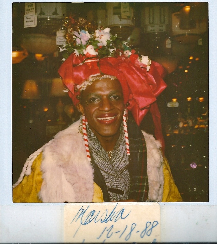 Download the full-sized image of A Photograph of Marsha P. Johnson Wearing a Christmas-Themed Headpiece